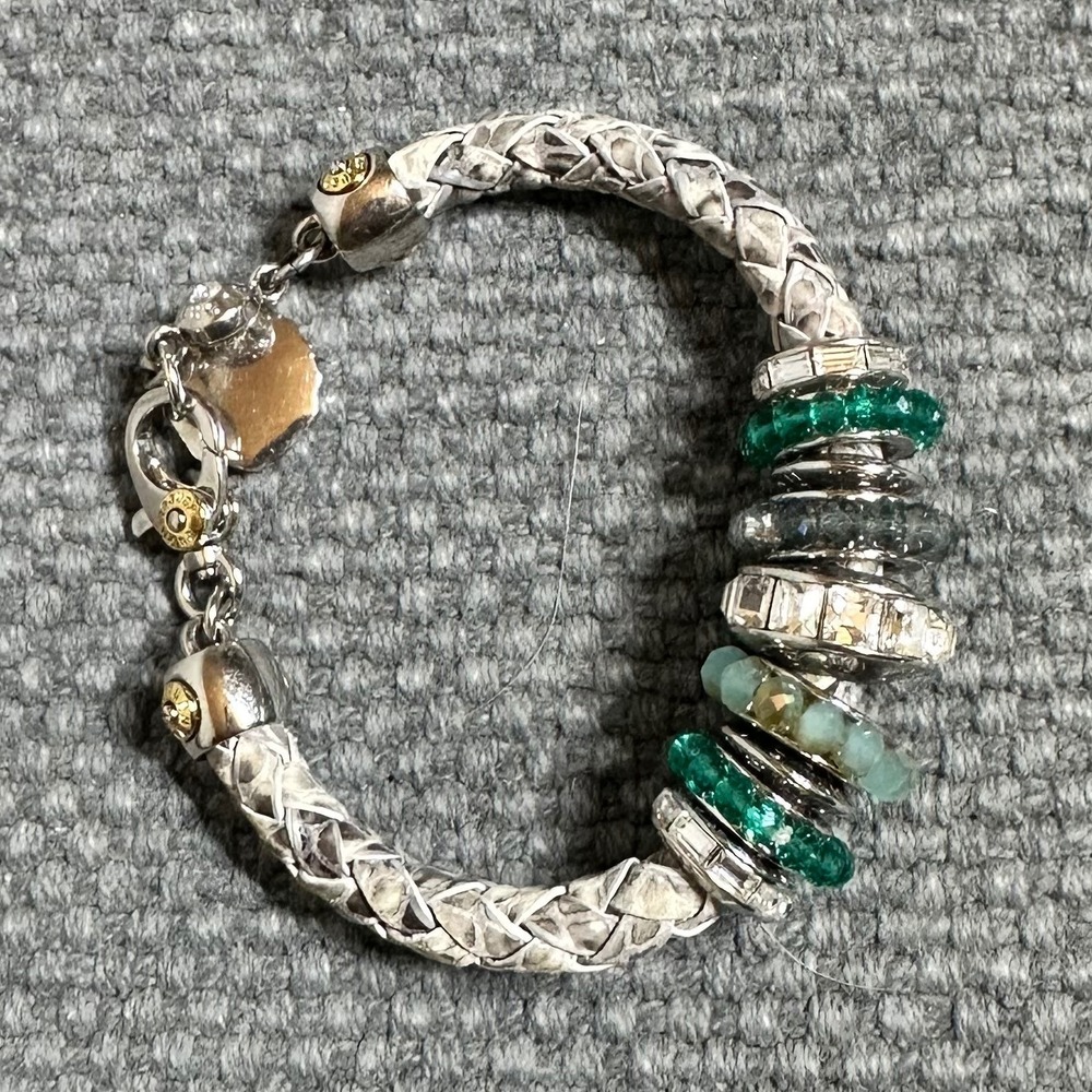 Discont/Retired Henri Bendel Leather Beaded Charm
Bracelet With Green And Clear